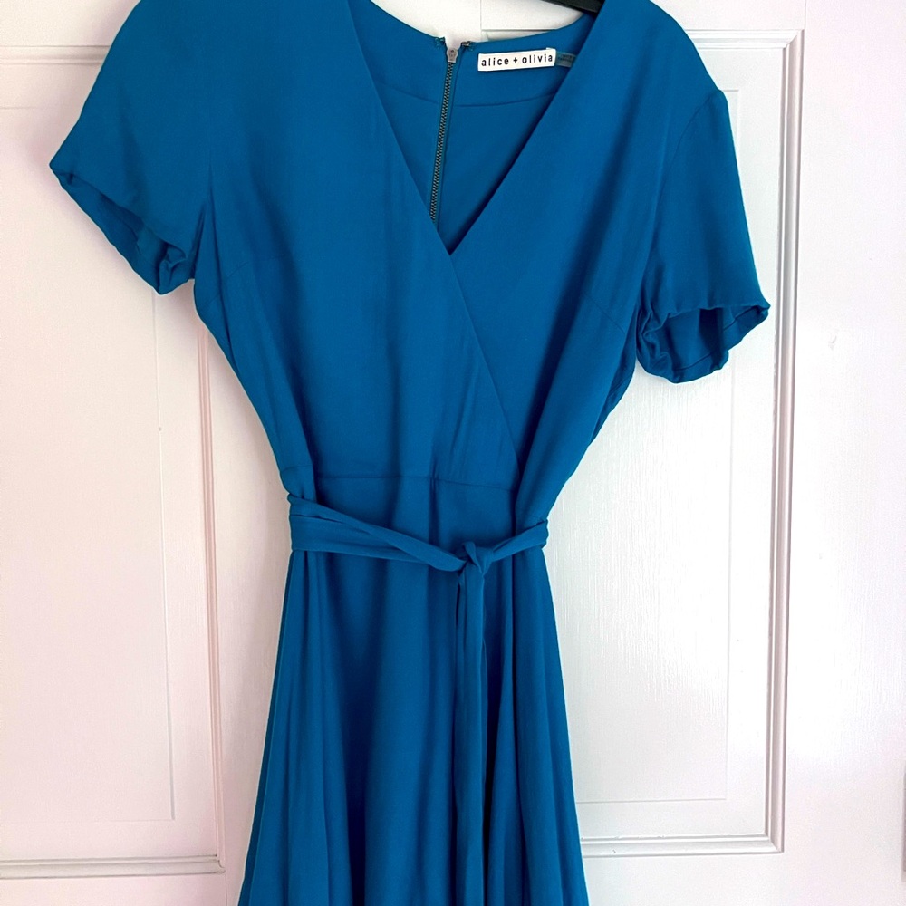 Alice & Olivia teal dress with short sleeves.